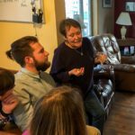 Florence Busch talks with volunteers