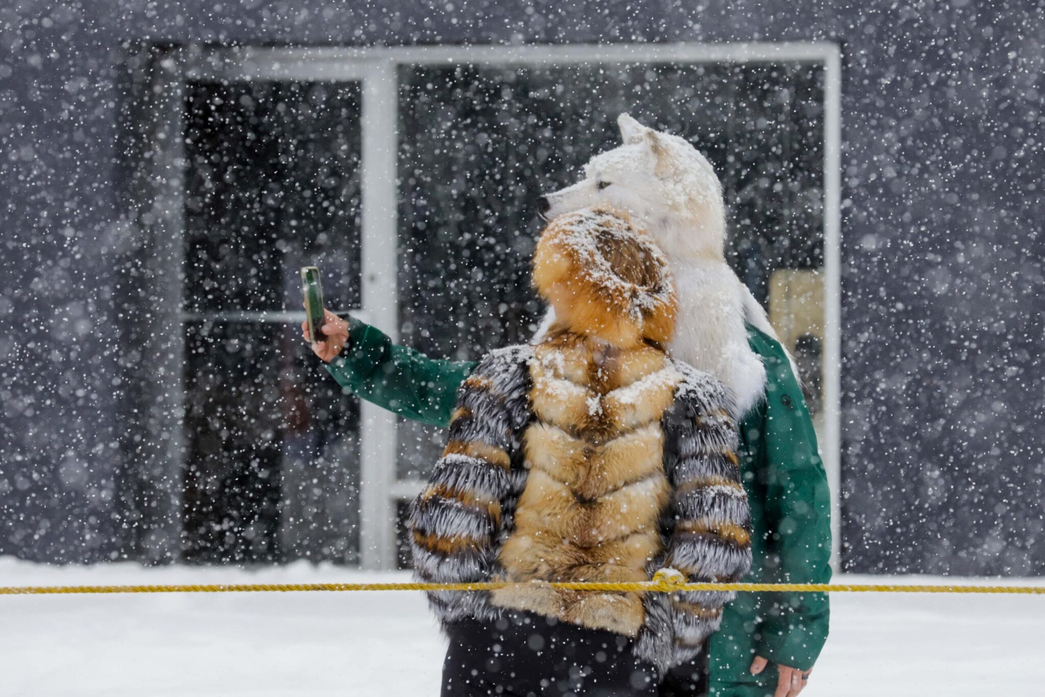 people wearing furs take a selfie