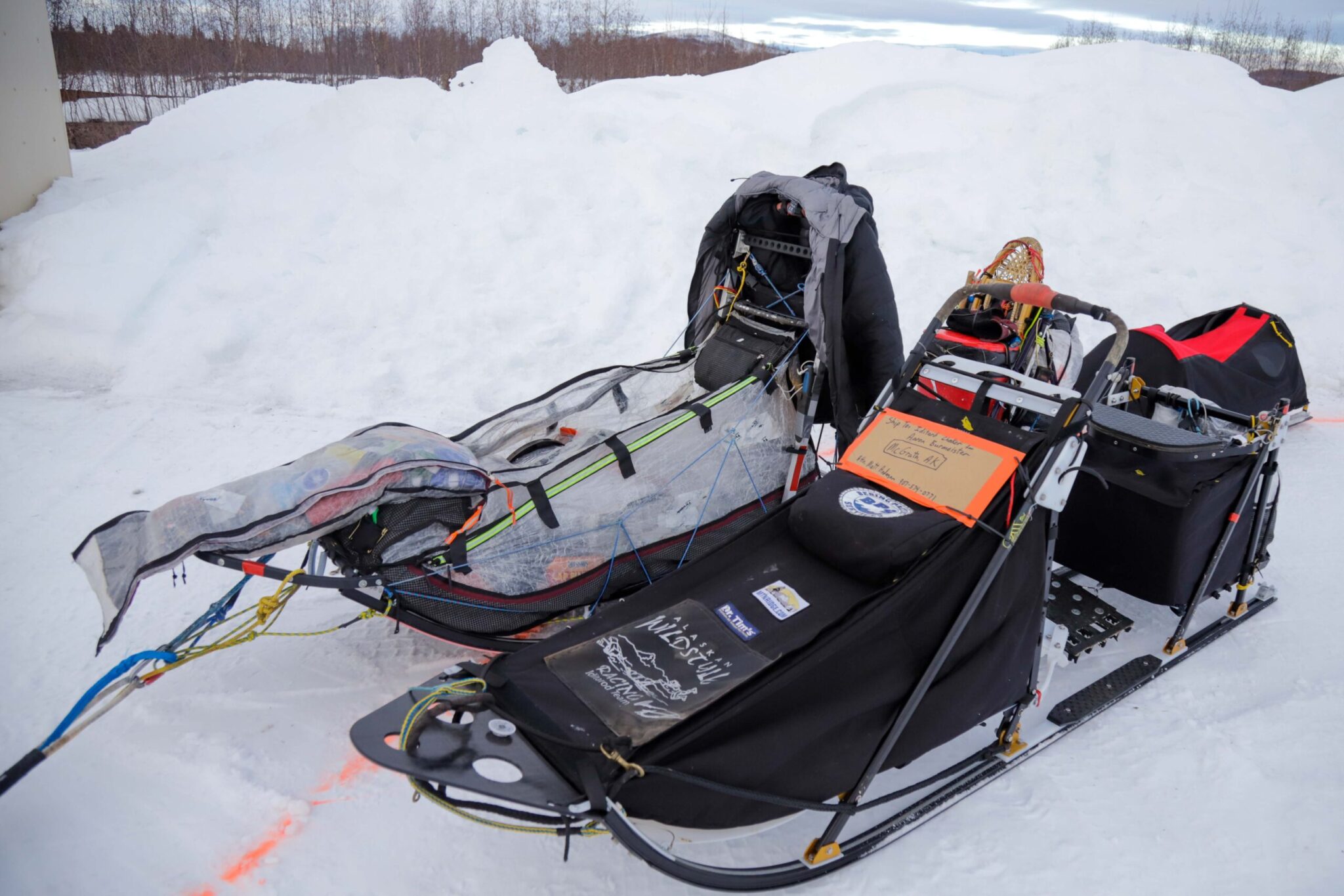 Two sleds next to each other