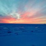 A sea ice sunset. (Photo: Maddie Winchester, KNOM)