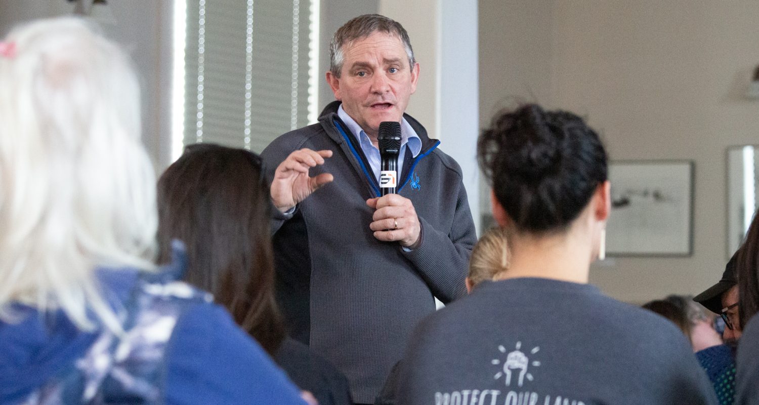 Kerry Ahmasuk looks on as Mike Schaffner addresses a community question. Ben Townsend photo.