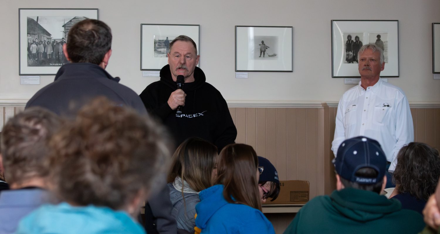 A Nome resident asks a question directed towards Mike Schaffner as Ed Fogels, the project's Permitting Manager, looks on. Ben Townsend photo.