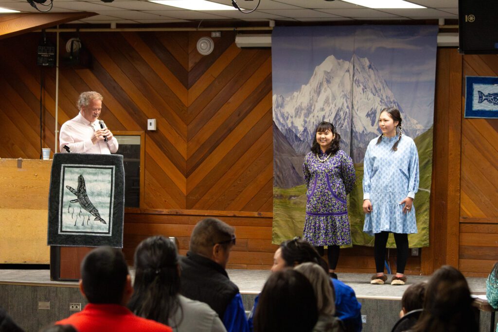 City of Nome Mayor and guest MC John Handeland introduces Victoria Gray and Charity Lewis at Miss ANB 2024. Ben Townsend photo.