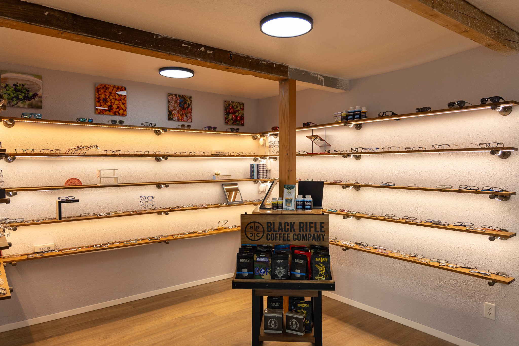 The lobby area of Last Frontier Eye Care, complete with coffee and illuminated shelving stocked with glasses. Ben Townsend photo.