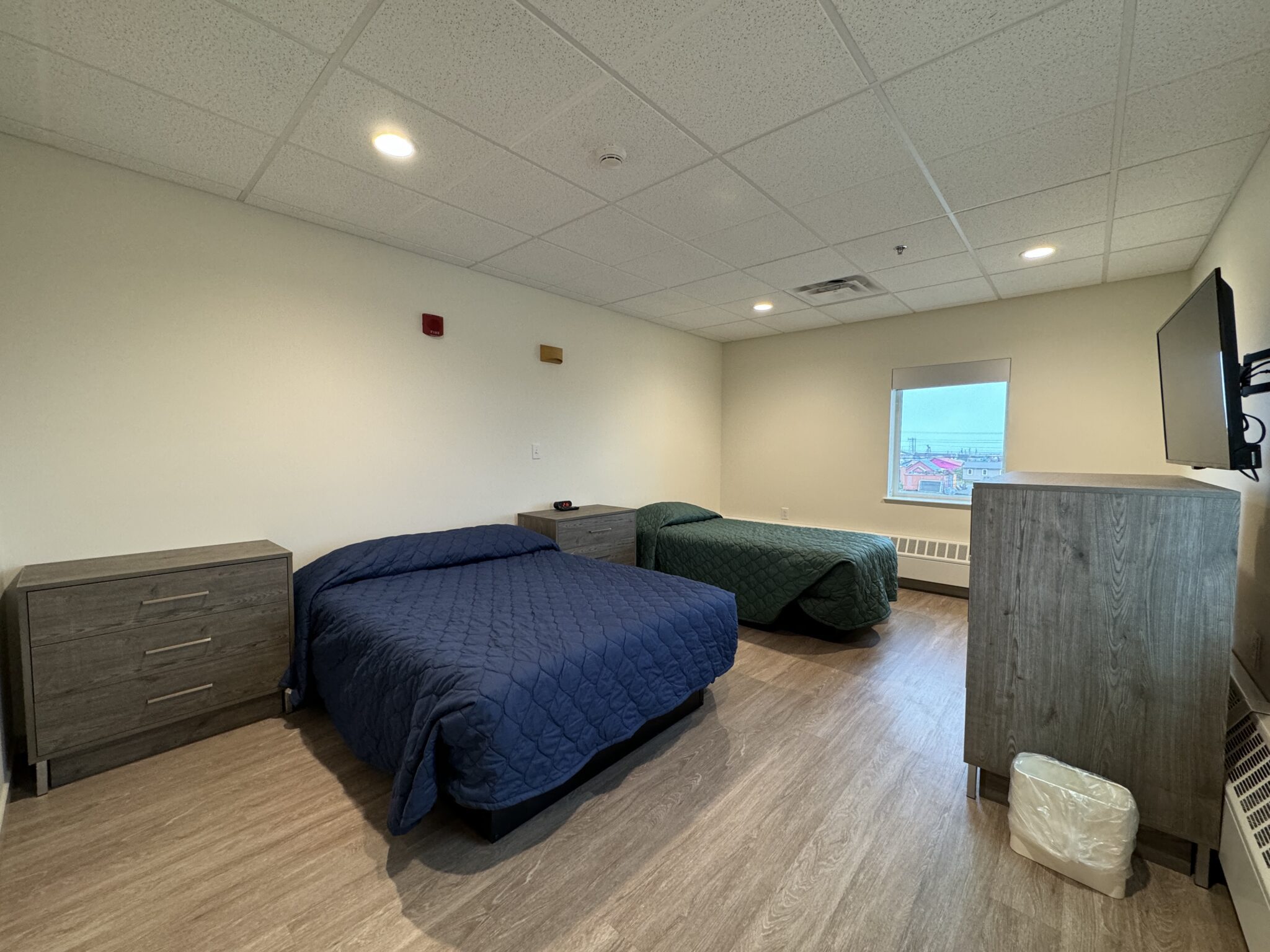 One of six rooms with a full and twin bed. Ben Townsend photo.