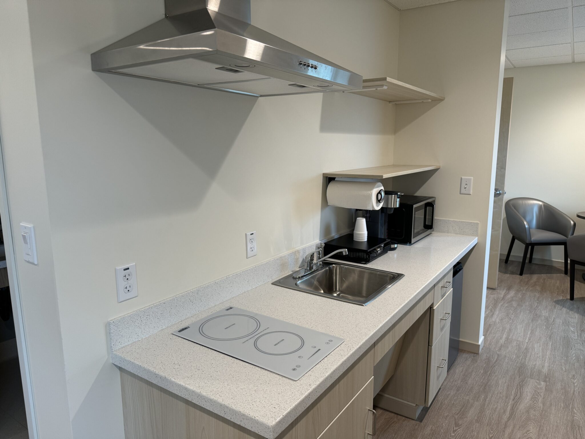 Two suites at Hostel West feature induction cooktops for use during extended stays. Ben Townsend photo.