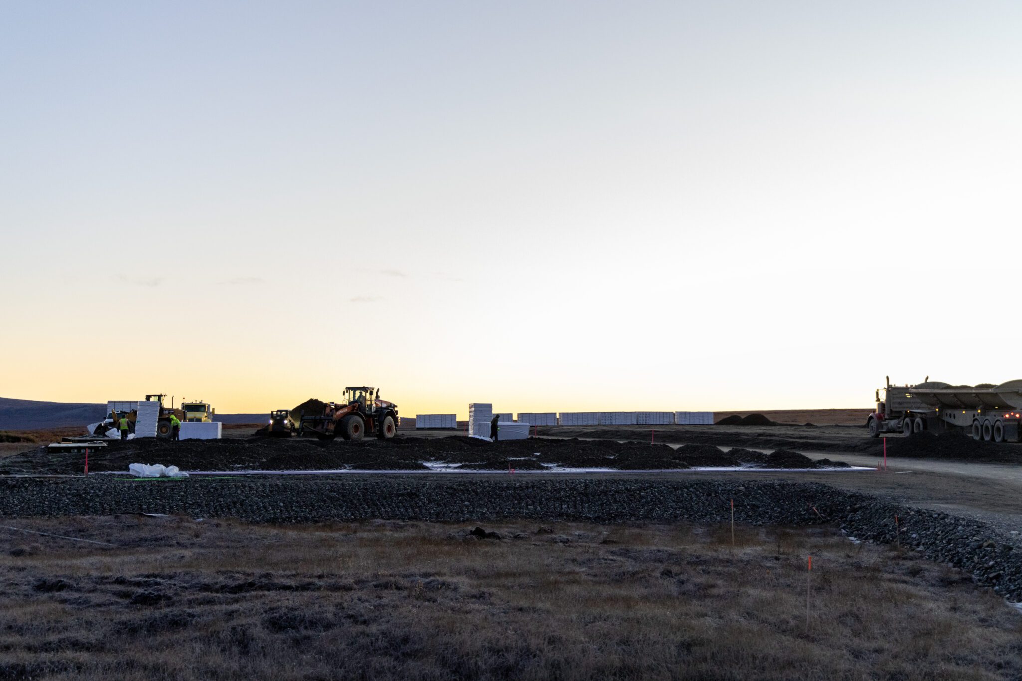 Construction vehicles operating on a new lot purchased by Norton Sound Health Corporation to build employee housing. Ben Townsend photo. 