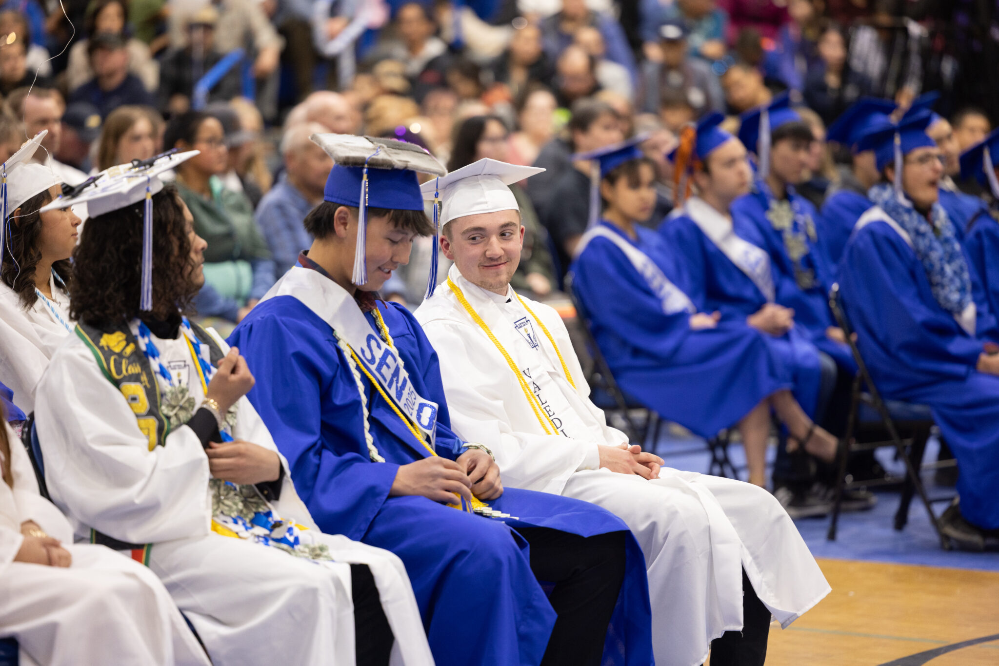 Luke Hansen sitting with Wyatt Ahmasuk. Laura Davis Collins photo.