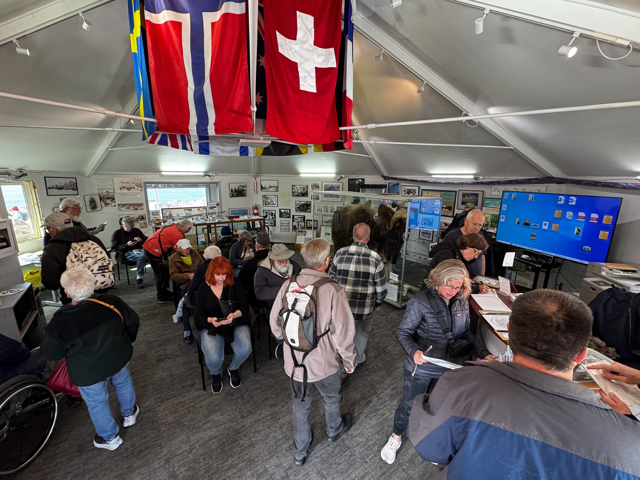 IMG_6937 Tourists shuffle through Nome's Visitor Center. Ben Townsend photo.