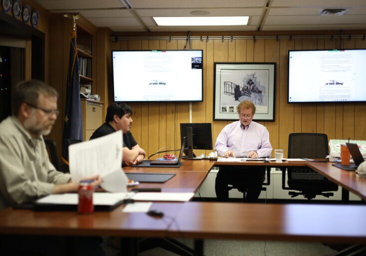 Mayor of Nome John Handeland reviews documents at a Nome Common Council meeting on November 25, 2024. Ben Townsend photo.