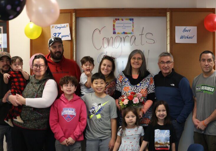 Sue Luke surrounded by her family at UAF NW. Ben Townsend photo.