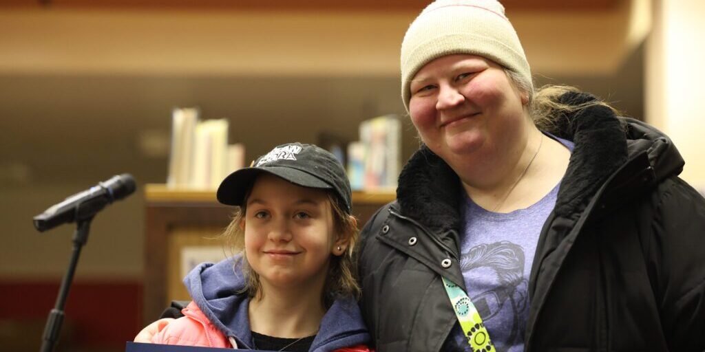 Teagan Olson, a sixth grader at Nome-Beltz, poses with a commemorative certificate for earning Student of the Month. Ben Townsend photo.