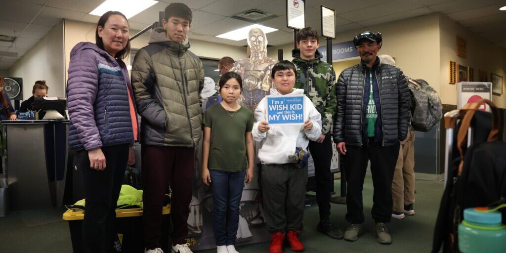 The Ningeulook family in the Nome Airport waiting area. Ben Townsend photo.