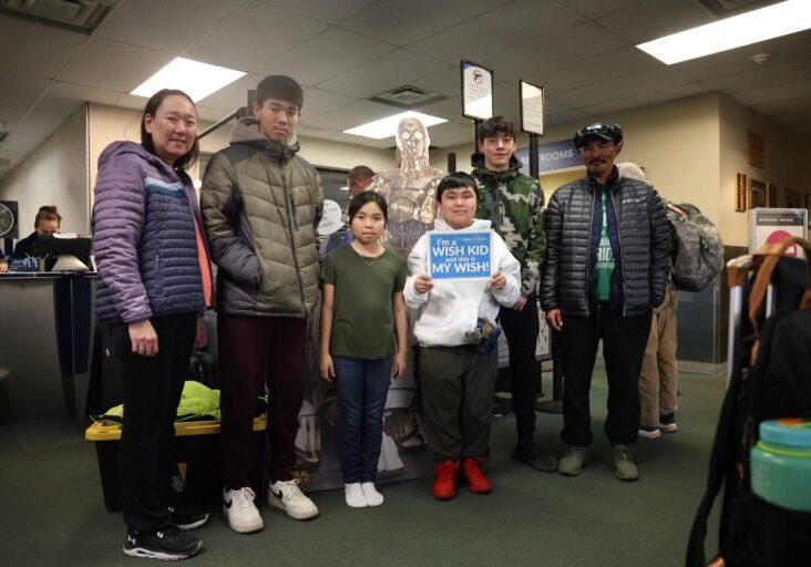 The Ningeulook family in the Nome Airport waiting area. Ben Townsend photo.