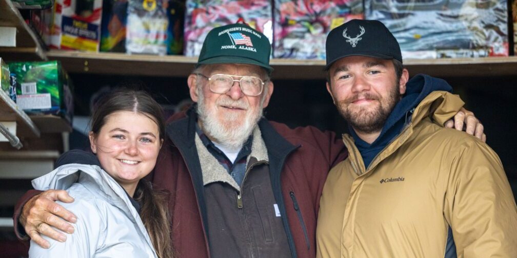 Leo Rasmussen poses with Tylar Hoffert and Kassidy Pehrson. Wali Rana photo.