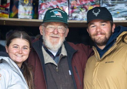 Leo Rasmussen poses with Tylar Hoffert and Kassidy Pehrson. Wali Rana photo.