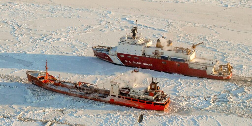 BERING SEA - The Coast Guard Cutter Healy breaks ice around the Russian-flagged tanker vessel Renda 250 miles south of Nome, Alaska, Jan. 6, 2012. The Healy is the Coast Guard's only current operating polar icebreaker. U.S. Coast Guard photo by Petty Officer 1st Class Sara Francis.