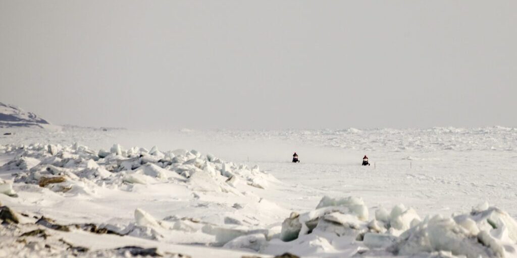 Leading Six Iron Dog Racers Jet Out of Unalakleet