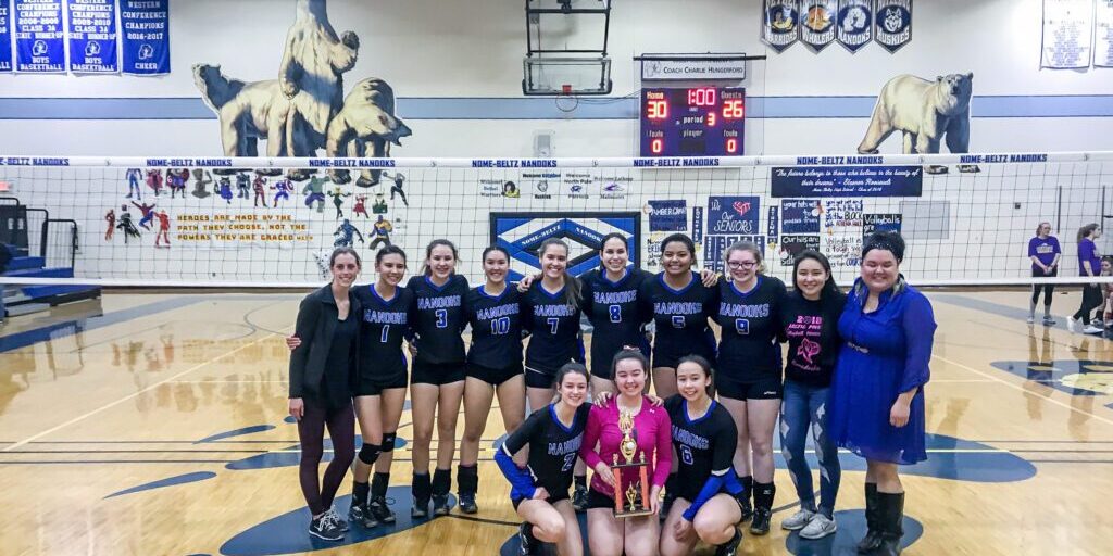 Lady Nanooks varsity volleyball team holds their trophy after the 2018 Arctic Pinkies Tournament in Nome. Back row, left to right: assistant coach Stephanie Stang, Terrie Rude, Abbie Tozier, Minnie Clark, Courtney Merchant, Kastyn Lie, Athena Hall, Sara Wade, Team Manger Brooke Anungazuk and Coach Lena Danner; front: Macy Witrosky, Erin Johanson and Amber Gray. Photo courtesy of Earl Merchant.