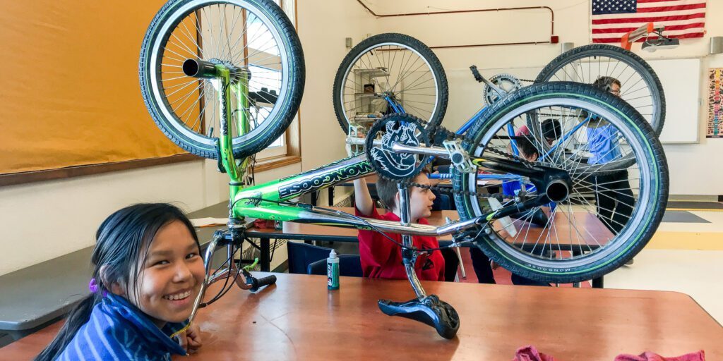 Recycling Bicycles | KNOM Radio Mission