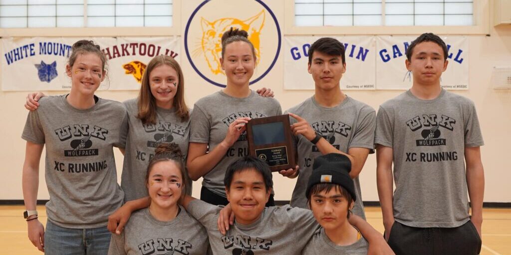 Unalakleet's boys and girls cross country teams pose for a photo. Photo courtesy of Thurman Jack. 