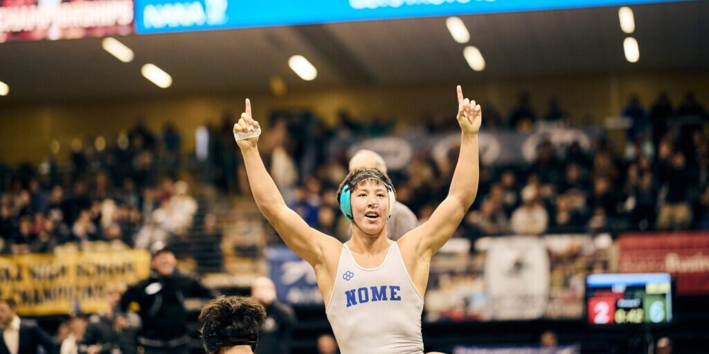 Wyatt Ahmasuk celebrates after pinning Mt. Edgecumbe’s Kaden Hermann. Photo courtesy of Junior Pikok.