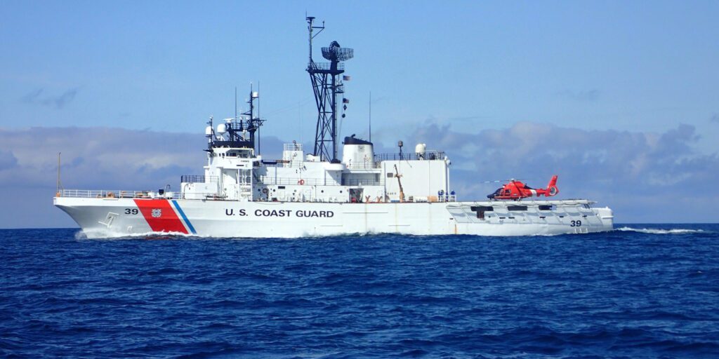 BERING SEA, Alaska - The Coast Guard Cutter Alex Haley is pictured before a Bering Sea patrol with a Coast Guard Air Station Kodiak MH-66 Dolphin helicopter embarked on the stern of the cutter, July 27th, 2018.  During Bering Sea patrols the cutter’s crew conducts boarding evolutions of the fishing fleet and can respond to search and rescue cases as needed.   U.S. Coast Guard photo.