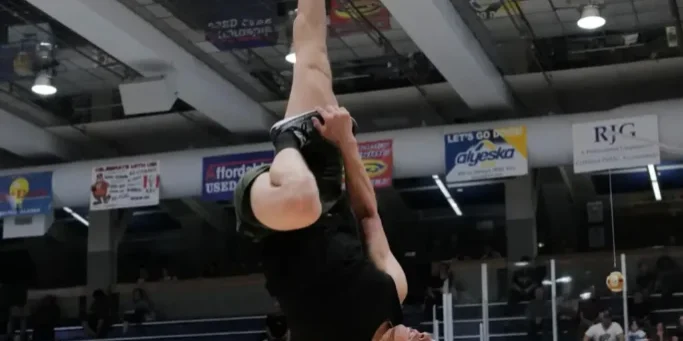 Parker Kenick extends his right foot to tap a ball tied to a string above the ground. The third-time participant in WEIO earned a score of 94 inches at the 2024 competition. Photo courtesy of Logan Hebel.