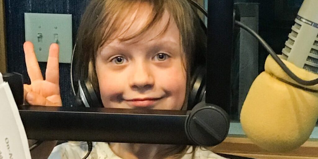 Harnessing Natural Radio Talent: KNOM’s Youngest Community Volunteer | KNOM Radio Mission