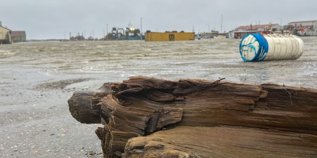 Typhoon Merbok has relocated debris and people's belongings across coastal land. Photo by Scotty Campbell, KNOM (2022).