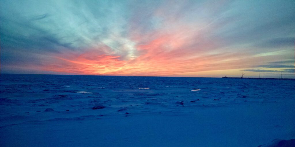 A sea ice sunset. (Photo: Maddie Winchester, KNOM)