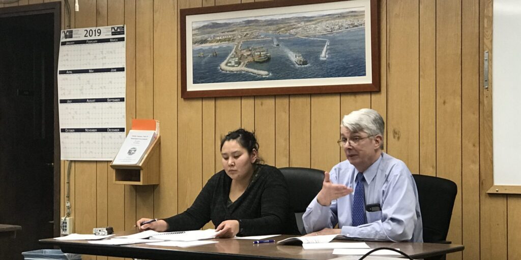 Deputy Clerk Christine Piscoya (left) and City Manager Glenn Steckman (right) at Nome City Council meeting in November, 2019. Photo from Emily Hofsteadter, KNOM (2019).