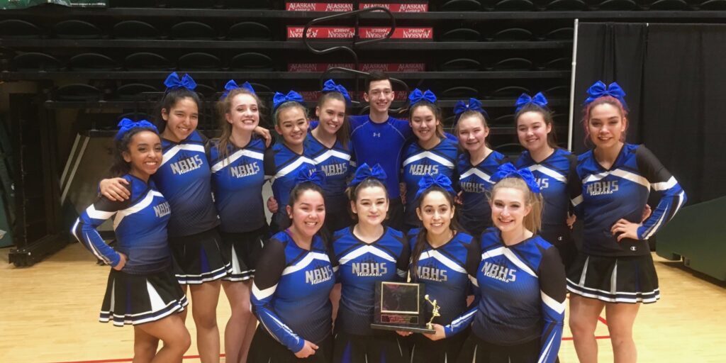 Nanooks Cheer Team Wins Division at State Championship | KNOM Radio Mission