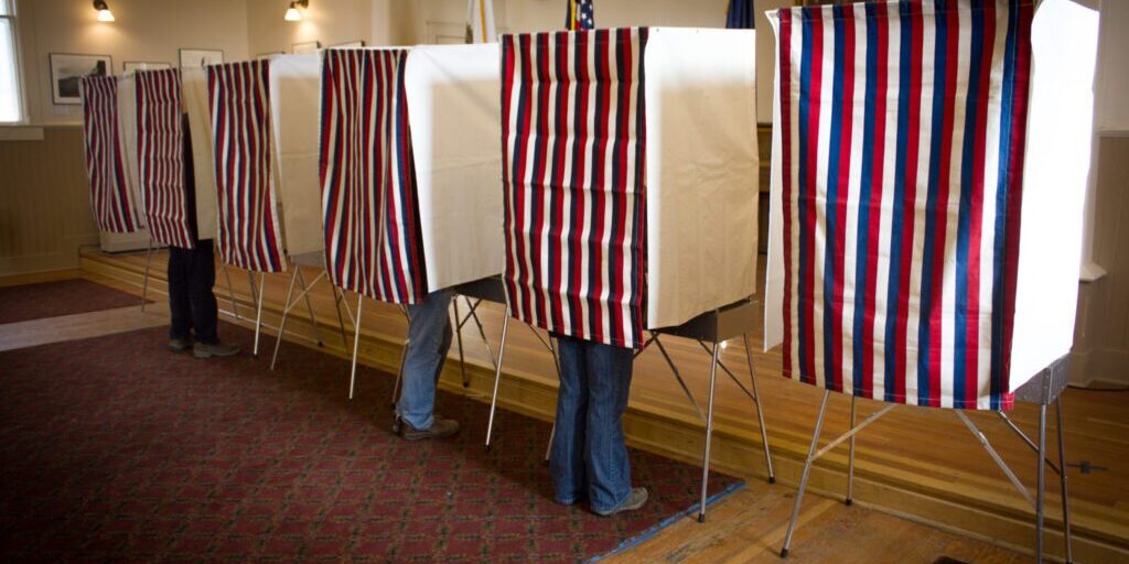 Voters cast their ballots at Old St. Joe's. Photo: Emily Russell, KNOM.