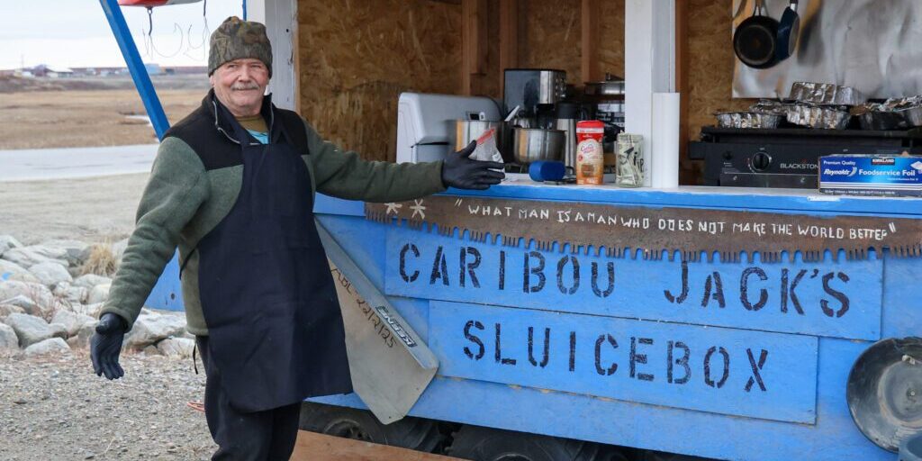 John Godsey, or "Caribou Jack," posing with his food trailer. Wali Rana photo.