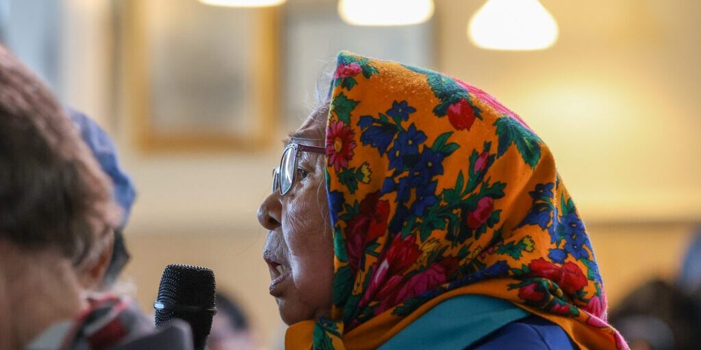 Arlene Soxie tells representatives from Graphite One that "you can't eat money, but you can eat the food that you put away," at a community meeting held on May 22, 2025. Ben Townsend photo.