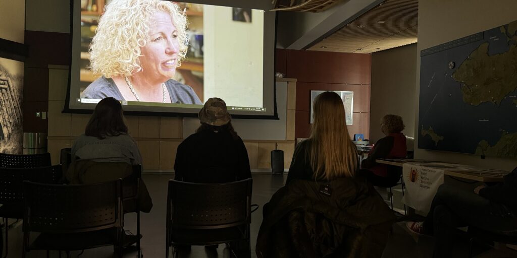 Gina Schumaker appears in a showing of the documentary “8 Keys for Adults with FASD” at the Katirvik Cultural Center in Nome. Sarah Swartz photo. 