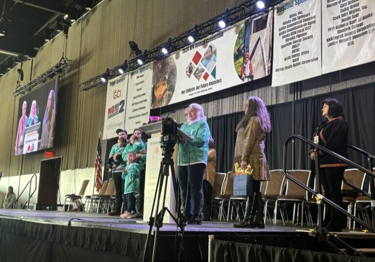 Marlene Haugen delivers a speech while accepting the Eileen Panigeo MacLean Education Award at the Alaska Federation of Natives Conference. Janice Homekingkeo photo. 