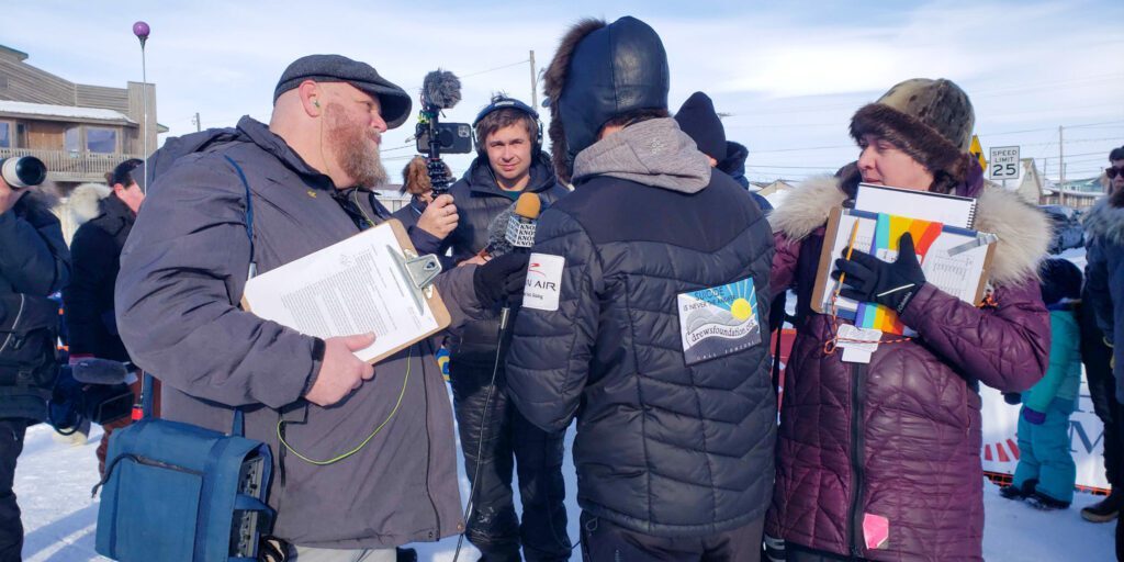 KNOMs-Scotty-Campbell-interviewing-Pete-Kaiser-at-finish-line-Photo-from-Davis-KNOM-2023